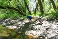 Children Playing Outside at the River