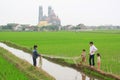 Children are playing in the paddy field in the countryside of the North of Vietnam Royalty Free Stock Photo