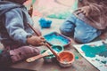 Children playing with paints and tempera Royalty Free Stock Photo