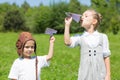 Children playing in the park paper airplanes Royalty Free Stock Photo