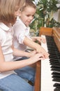 Children Playing the Piano Royalty Free Stock Photo