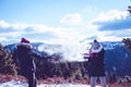 Children playing snowball fight.