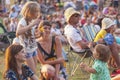 Children playing with soap bubbles during a concert of classical Royalty Free Stock Photo