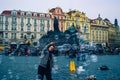 A Man creating in Soap Bubbles in Prague Town Square