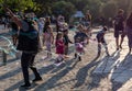 Children playing with soap bubles in the light of sunset Royalty Free Stock Photo