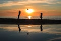 Children playing in sunset with ball, silhouettes, freedom and happiness Royalty Free Stock Photo