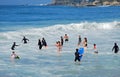 Children playing in the surf of Sleepy Hollow Beach in Laguna Beach, California.