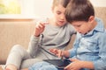 Children playing with tablet pc Royalty Free Stock Photo