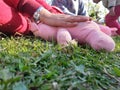 Children playing with teddy bear in a park. Body parts of Kids seems playing with toys. Children often express emotions and