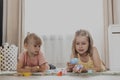 Children playing with toy building blocks on the floor at home or kindergarten Royalty Free Stock Photo