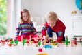 Children playing with toy railroad and train Royalty Free Stock Photo