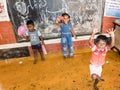 Children playing with toys balloon on the floor of the children`s room. Kindergarten educational games in India Royalty Free Stock Photo