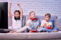 children playing video game with game console Royalty Free Stock Photo