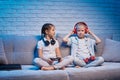 children playing video game with game console Royalty Free Stock Photo