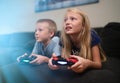 Children playing video games Royalty Free Stock Photo