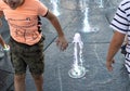 Children playing in a water fountain in Lublin Royalty Free Stock Photo