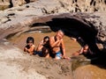 Ubon Ratchathani,05 December 2011 , Children are playing a water the Grand Canyon of Thailand Stone mountain at Sam Phan Bok,Tha