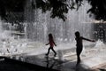 Children playing in water Royalty Free Stock Photo