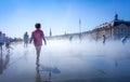 Children playing in Water Mirror. Bordeaux, France Royalty Free Stock Photo