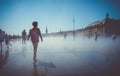 Children playing in Water Mirror. Bordeaux, France Royalty Free Stock Photo