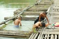 Children playing water in the river