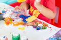 Children playing with watercolor stay at home. little boy and water colors. Royalty Free Stock Photo