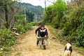 Children playing with wheelbarrow