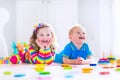 Children playing with wooden toys