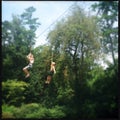 Children playing on a zip line