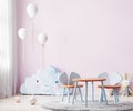 Children playroom with pink wall and kids table, children room interior mock up with soft toys and balloons, 3d rendering