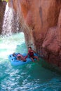 Children in the pool with a waterfall and decorative mountains. Turkey 2020.10.15 Belek