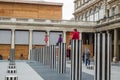 Children pose on column tops at Colonnes de Buren, Palais Royal, Paris Royalty Free Stock Photo