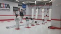 The children practice Taekwondo in the professional Taekwondo Hall under the guidance of the coach