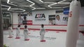 The children practice Taekwondo in the professional Taekwondo Hall under the guidance of the coach