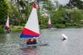 Children practicing sailing on a Spring day in South Norwood lake