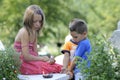 children praying in cemetery Royalty Free Stock Photo