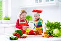 Children preparing healthy vegetable lunch Royalty Free Stock Photo