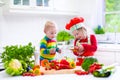 Children preparing healthy vegetable lunch Royalty Free Stock Photo