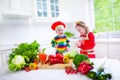 Children preparing healthy vegetable lunch Royalty Free Stock Photo