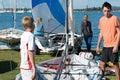 Children preparing racing dinghies at championships. April 18, 2013: Editorial