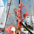 Children preparing racing dinghies at championships. April 18, 2013: Editorial