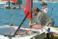 Children preparing racing dinghies at championships. April 18