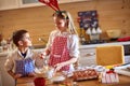 Children preparing xmas cookies