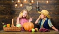 Children presenting farm harvest wooden background. Family farm. Reasons why every child should experience farming. Held