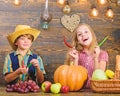 Children presenting farm harvest wooden background. Reasons why every child should experience farming. Farm market