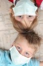 Children with pretection flu mask Royalty Free Stock Photo