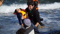 Children are pulled out of the boat. Royalty Free Stock Photo