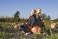 Children on pumpkin field