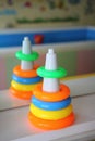 Children pyramid toy before a Mirror