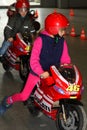 The children with the racing motorcycles